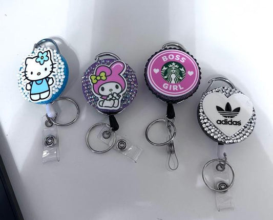 Badge Reels with and without rhinestones