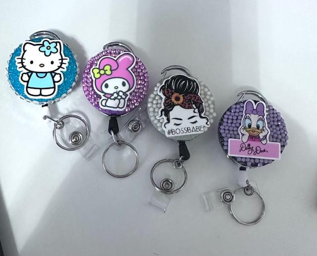 Badge Reels with and without rhinestones