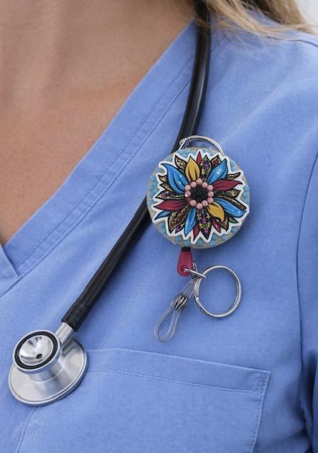 Badge Reels with and without rhinestones